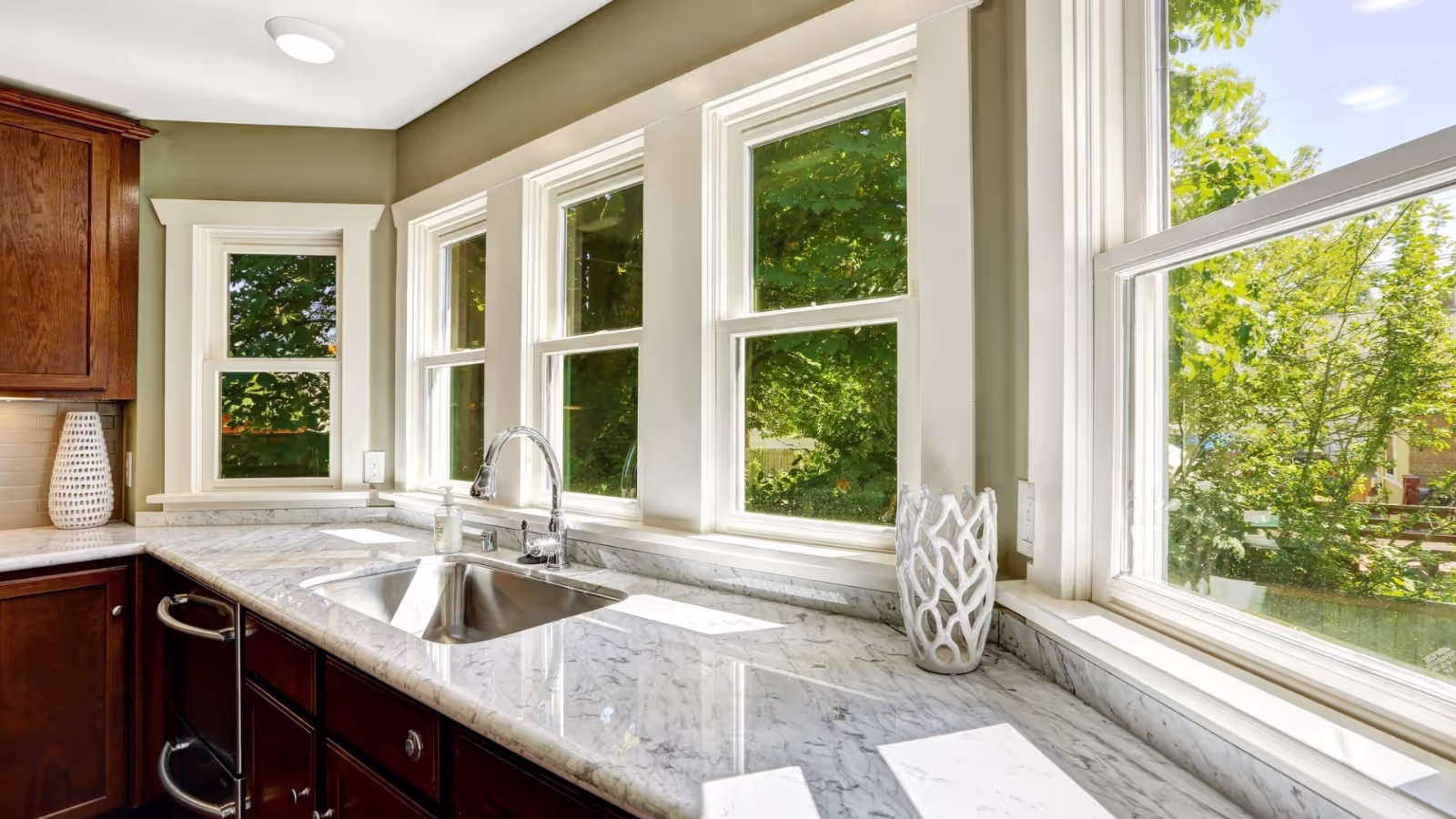 marble kitchen countertops with brown cabinets
