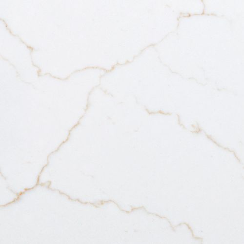 Close-up of Calacatta Miraggio Gold quartz with bold gold veining